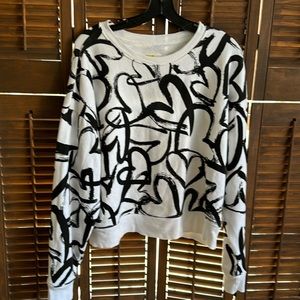Anthropologie black and white heart printed sweater size small